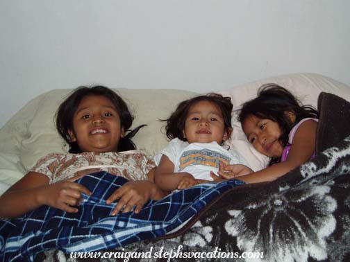 Paola, Aracely, and Yoselin in our bed Paola, Aracely, and Yoselin in our bed
