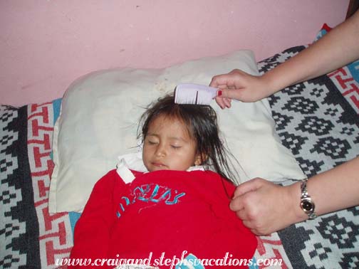 Combing Aracely's hair as she sleeps Combing Aracely's hair as she sleeps