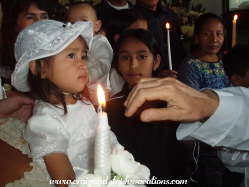 The priest blesses Aracely The priest blesses Aracely