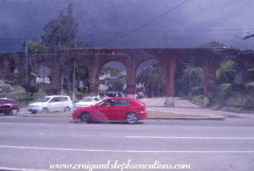 Storm clouds behid the aqueduct, Guatemala City Storm clouds behid the aqueduct, Guatemala City