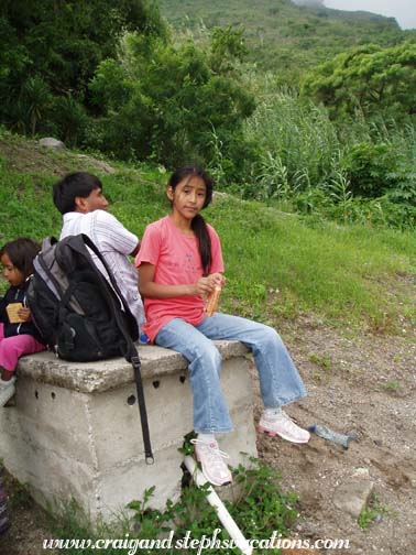Vanesa eats a snack by the lake Vanesa eats a snack by the lake