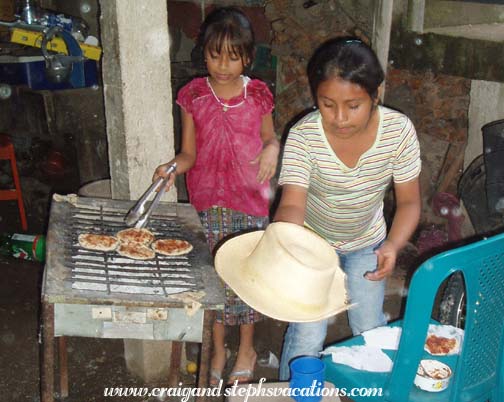 Pamela and Paola making tortillas Pamela and Paola making tortillas