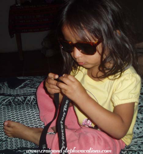 Aracely inspects the headlamp Aracely inspects the headlamp