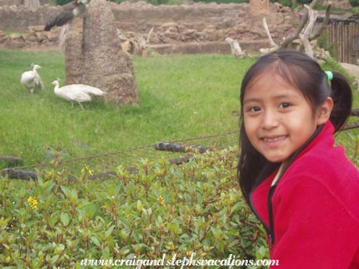 Yoselin with the peacocks