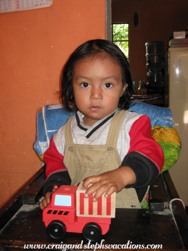 Eddy plays with one of his trucks Eddy plays with one of his trucks