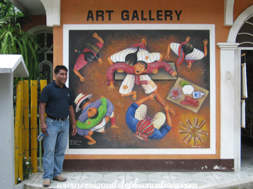 Humberto explains a mural of traditional Mayan medicine, San Juan la Laguna Humberto explains a mural of traditional Mayan medicine, San Juan la Laguna
