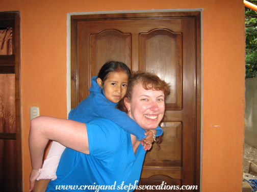 Steph gives Aracely a piggyback ride Steph gives Aracely a piggyback ride