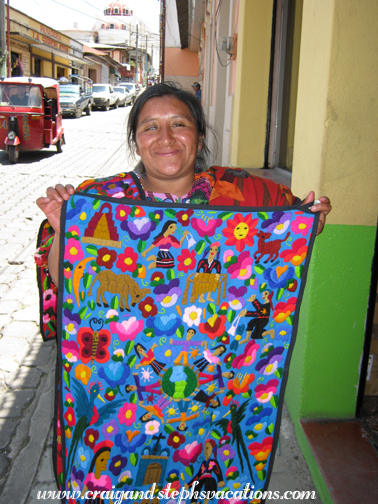 Rosa with the textile she sold us Rosa with the textile she sold us