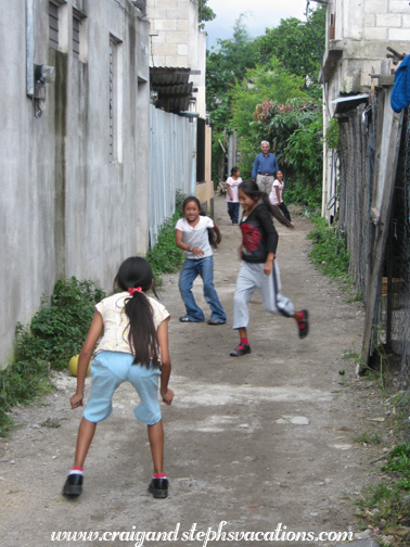 Girls playing ball in the alley Girls playing ball in the alley