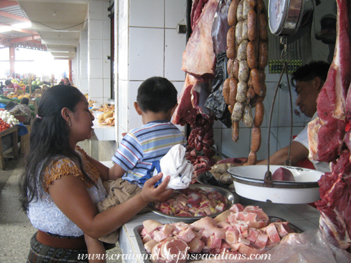 Paulina and Eddy at the butcher
