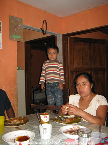 Eddy standing in his high chair Eddy standing in his high chair