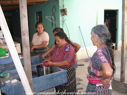 Juana, Paola, Olga, and Abuela preparing beets