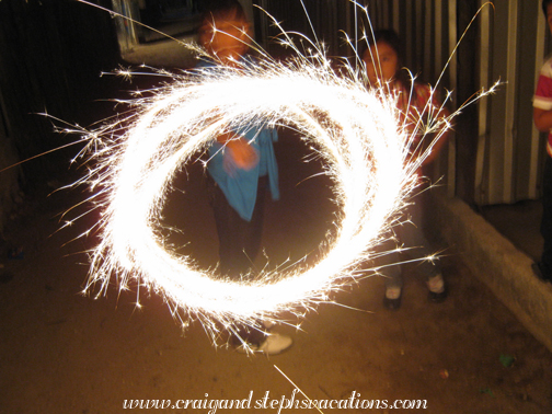 Yasmin and Neli playing with sparklers