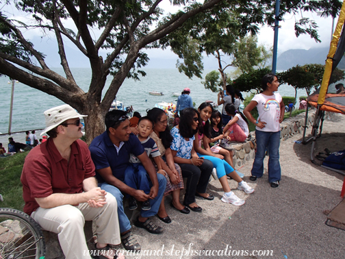 The family sitting by the lake The family sitting by the lake
