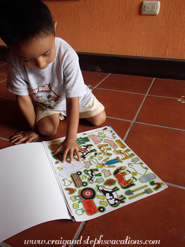 Eddy plays with the sticker book Eddy plays with the sticker book