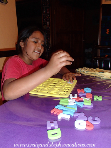 Yasmin plays with the puzzle Yasmin plays with the puzzle