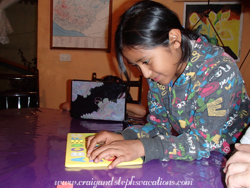 Yoselin plays with the puzzle Yoselin plays with the puzzle