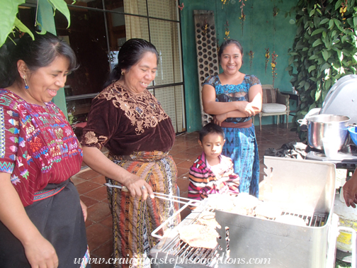 Rosa, Prisceda, Eddy, and Paulina at the grill