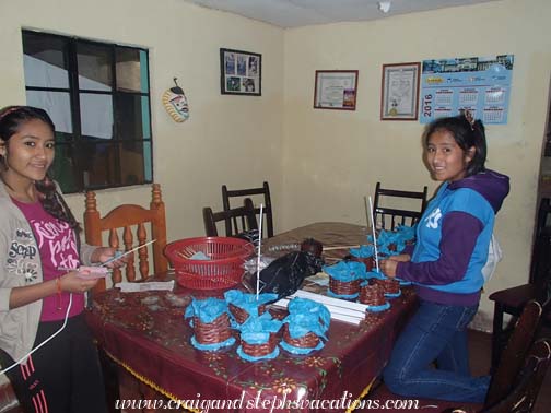 Vanesa and Yasmin put finishing touches on the party centerpieces Vanesa and Yasmin put finishing touches on the party centerpieces
