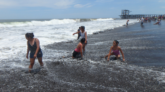 Playing in the waves at Champerico