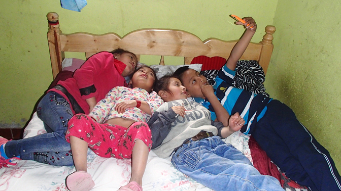 Sisa, Shina, Yupanqui, and Eddy watching videos