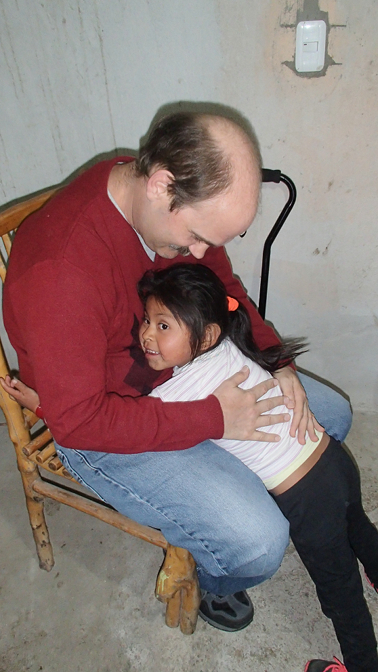 Shina gives Achi Taita a big hug