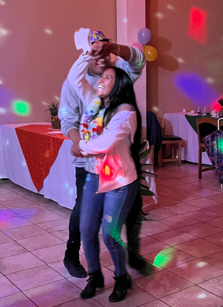 Joel dancing with Aracely