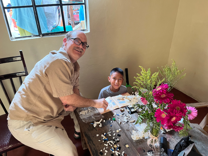 Craig helps Ian find pieces for his dinosaur skeletons