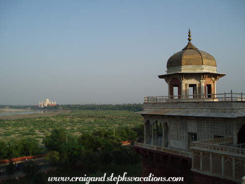 Mussaman Burj with Taj Mahal visible in the distance Mussaman Burj with Taj Mahal visible in the distance