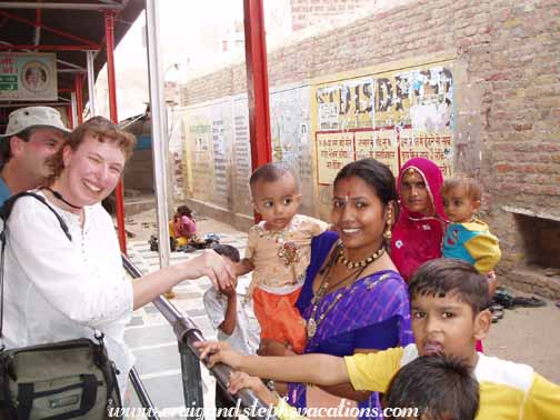 Woman asks us to shake her baby's hand