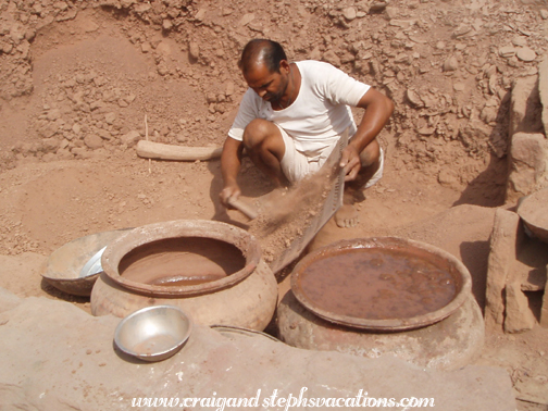 Mr. Achlaram breaks up clay