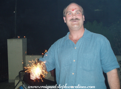 Craig holding up a sparkler