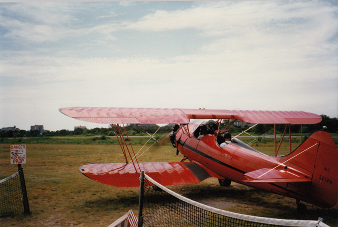 Tom and Margaret about to take off in a biplane Tom and Margaret about to take off in a biplane