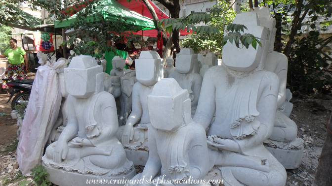 Marble Buddhas await their faces Marble Buddhas await their faces
