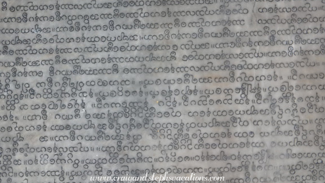 Detail of Pali inscriptions on a marble tablet