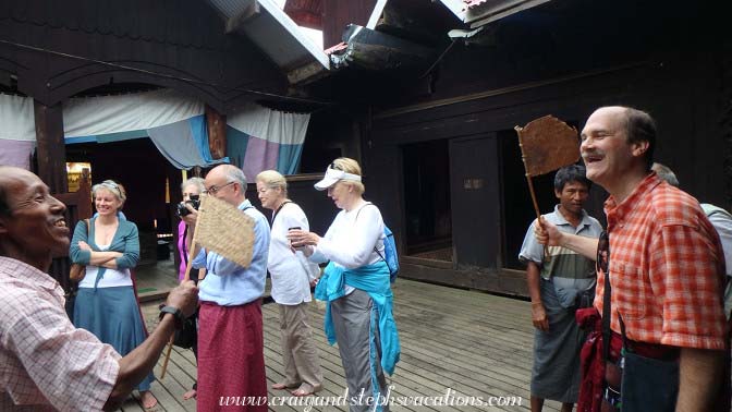 The villagers fan Craig at Kann Monastery