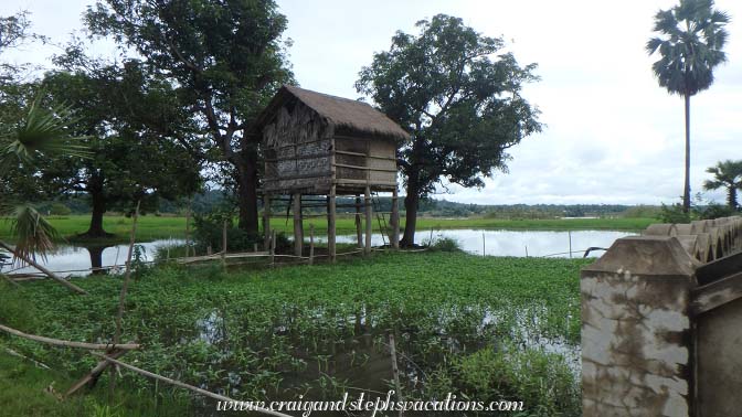 Elevated dwelling, floodplains approaching Kyi Taung Village