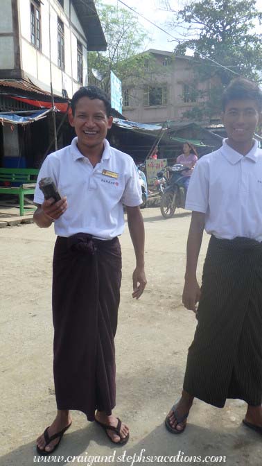Crew members buy a sledge hammer head at the hardware store