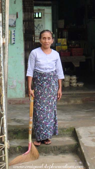 Woman sweeping the steps