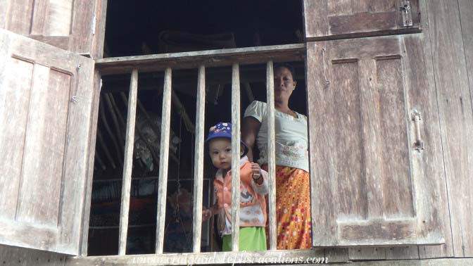 Toddler peeks out at us