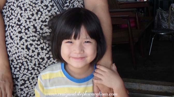 Daughter of shopkeeper from whom I bought an embroidered longyi