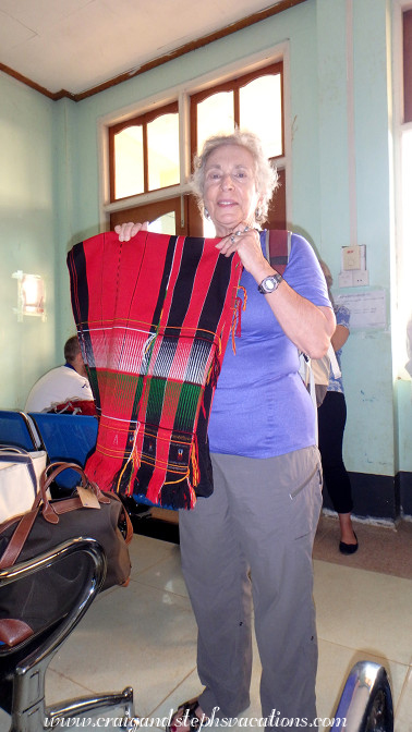 Esther buys a Naga blanket near the airport Esther buys a Naga blanket near the airport