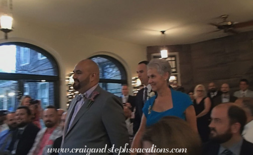 Dave's mom walks him down the aisle