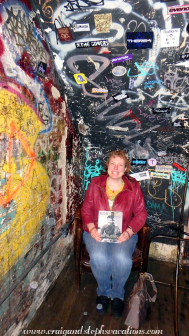Steph and her new book of Dylan photographs in the West Village, 315 Bowery, formerly CBGB