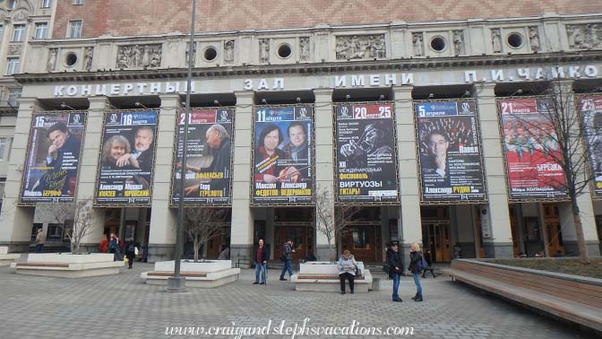 Craig underneath a poster advertising tonight's concert; Tchaikovsky Concert Hall