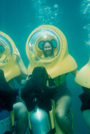 Beth on a BOB underwater scooter (head not to scale)