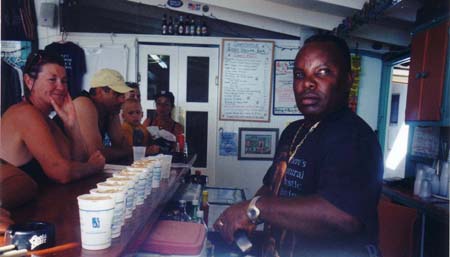 Bartender making painkillers at the Soggy Dollar Bar