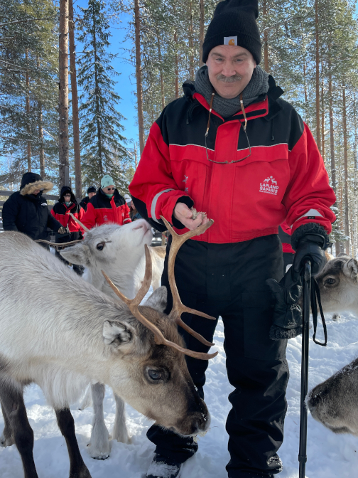 Craig feeds reindeer